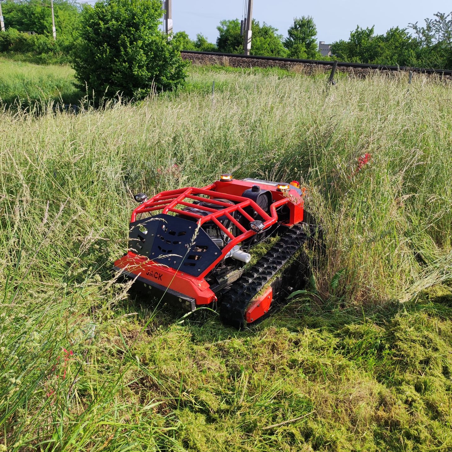 Jack Mulcher crawler mower during slope maintenance